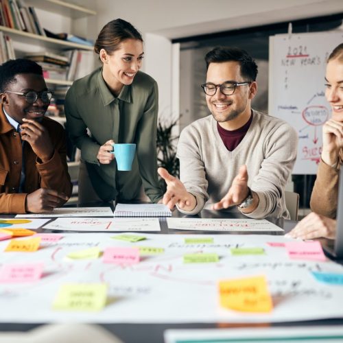 happy-creative-marketing-team-working-on-new-business-project-in-the-office-.jpg